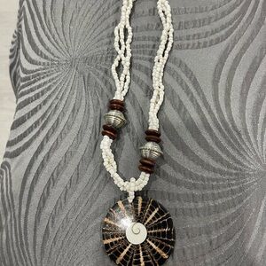 Very unique necklace in white never worn
